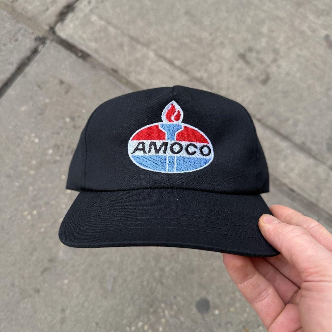 Black snapback hat, logo embroidery