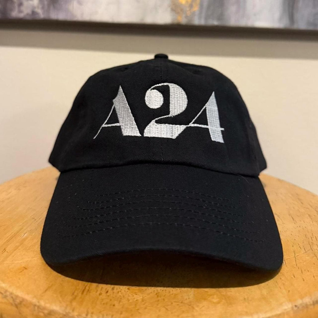 A24 films strap back hat