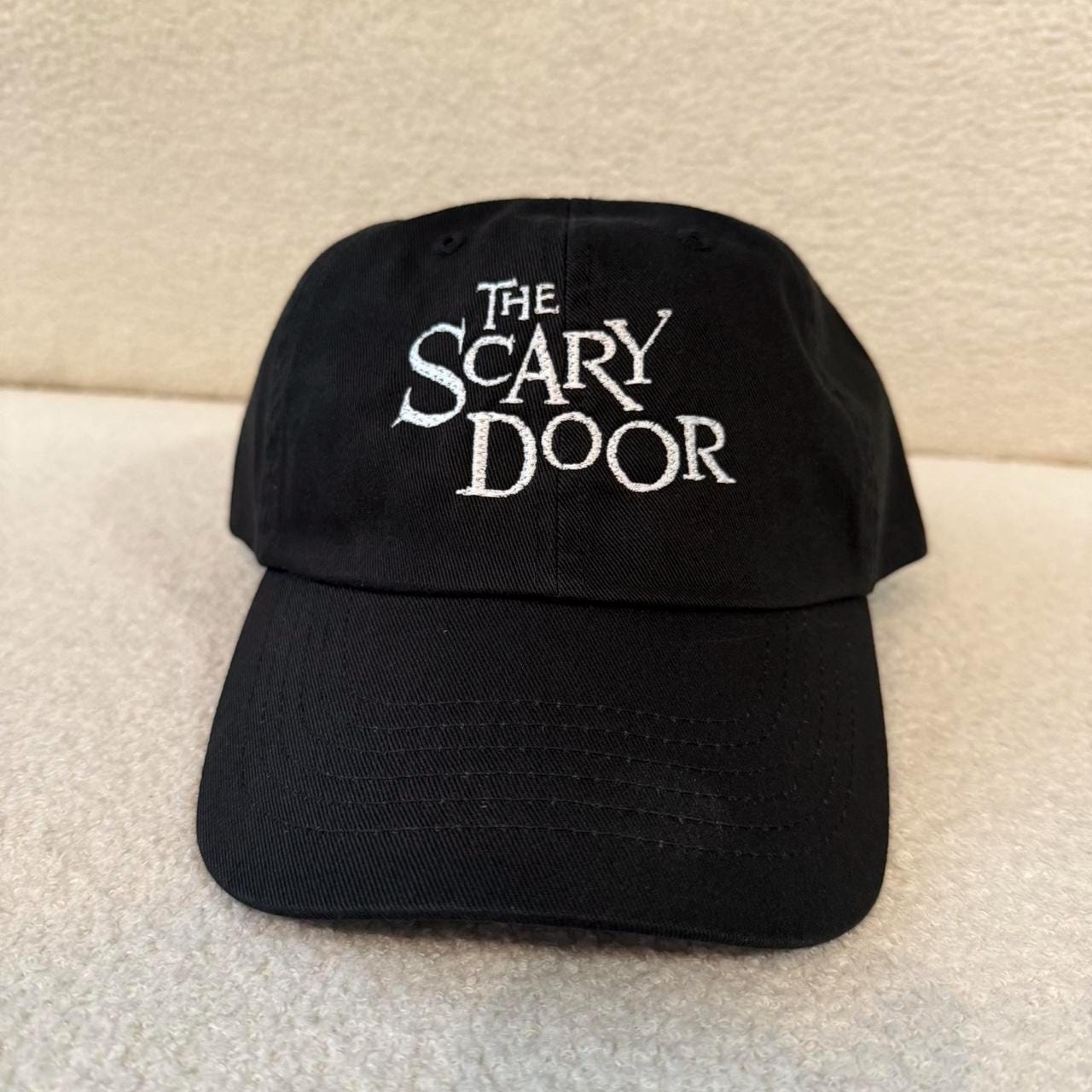 The scary door futurama strap back dad hat