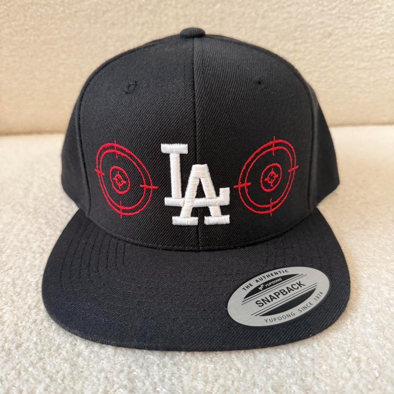 Black and red Los Angeles Dodgers bullseye crosshairs snapback hat