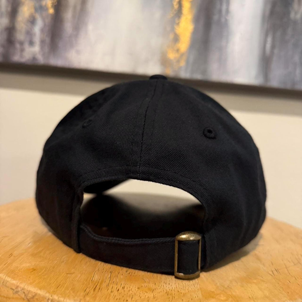 A24 films strap back hat
