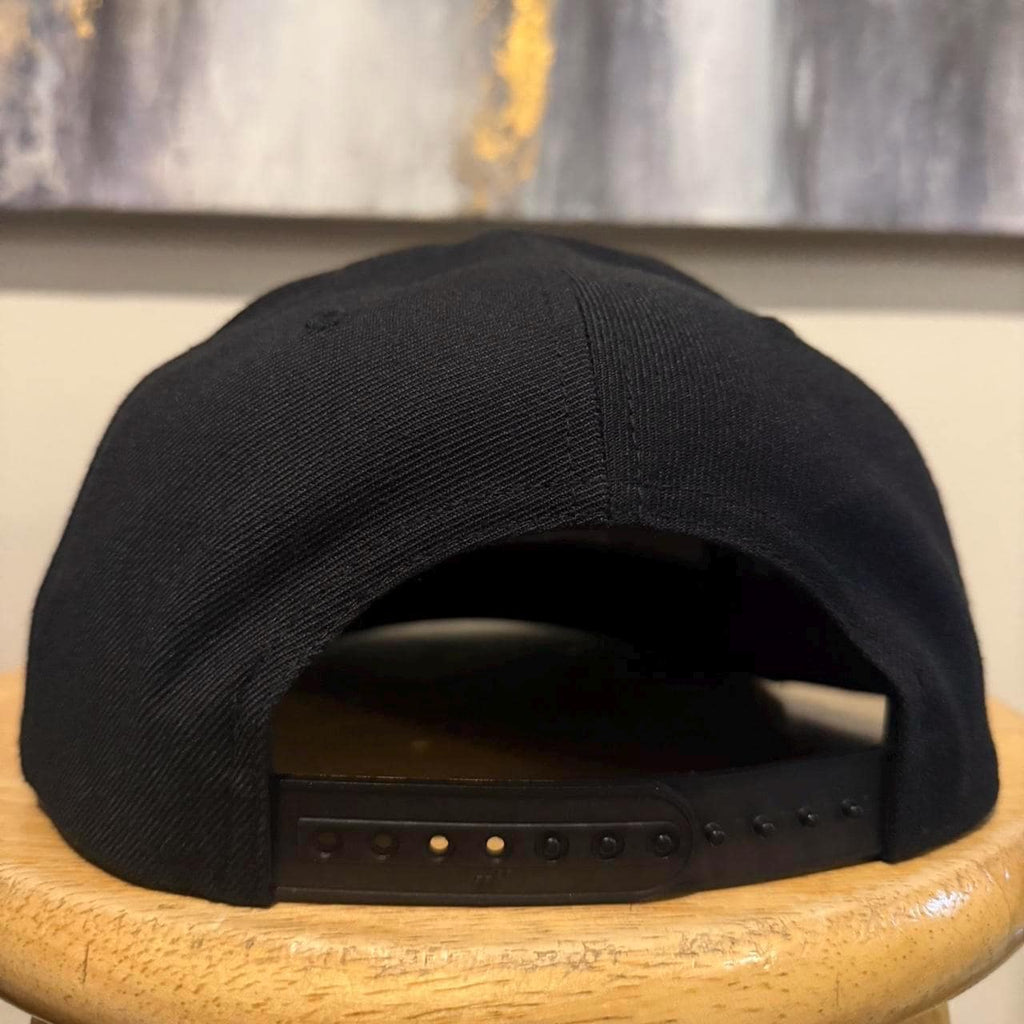 A24 black SnapBack hat