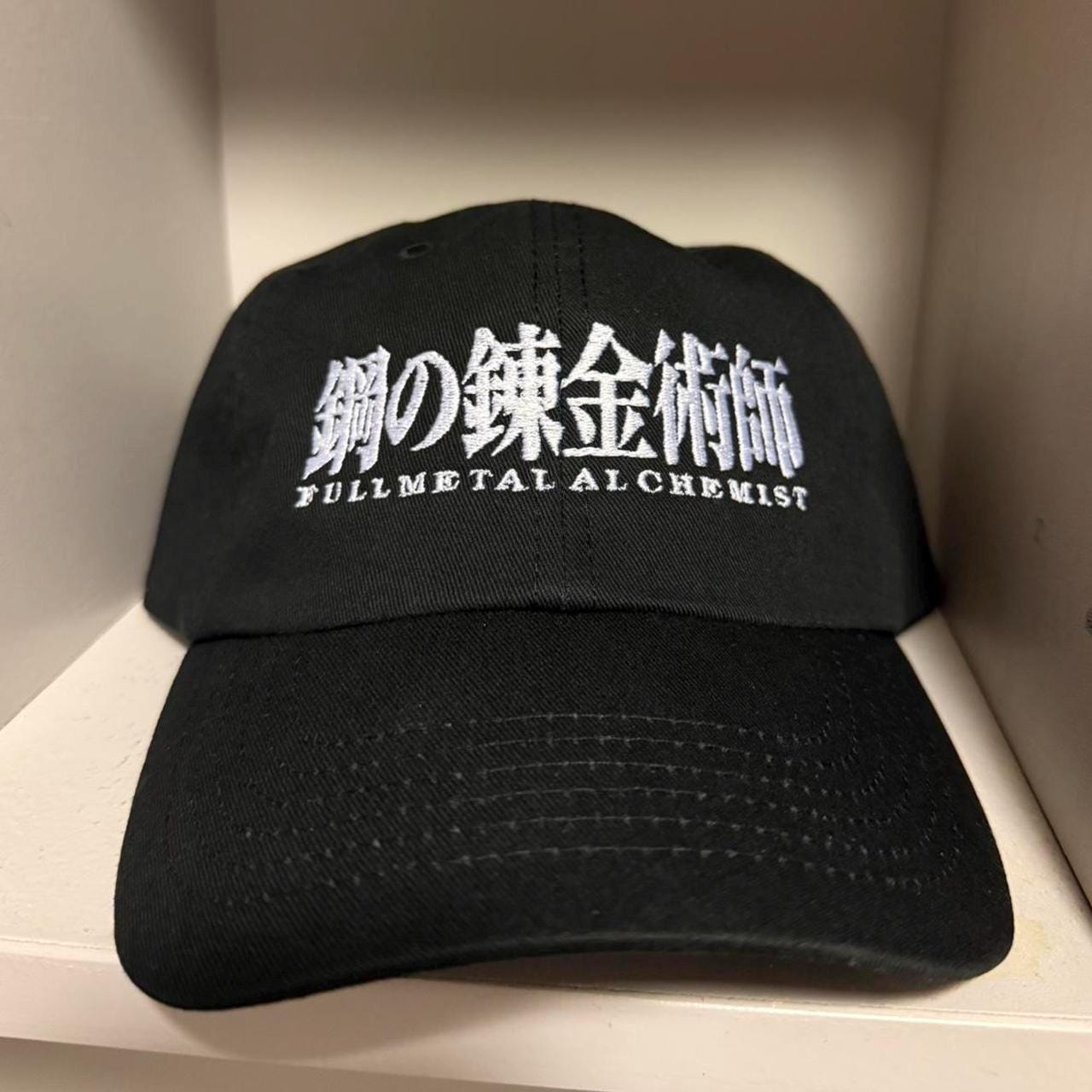 Full Metal Alchemist black and white strap back dad hat