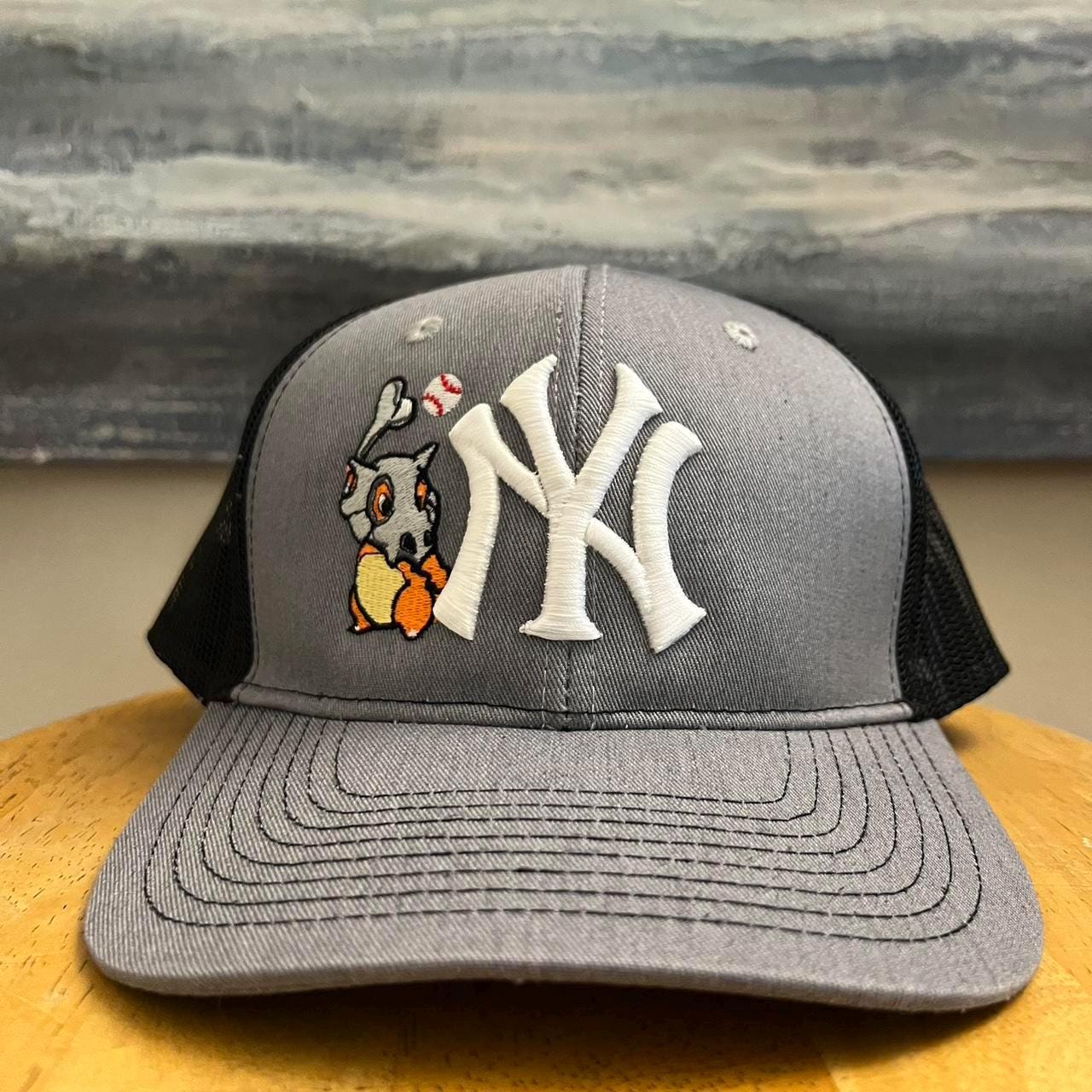 Grey and black Yankees Cubone Pokemon trucker hat